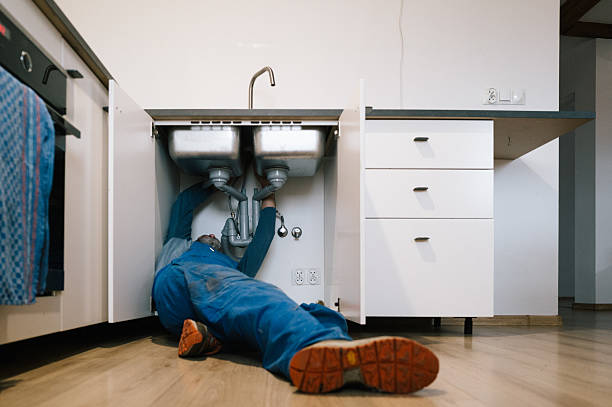 Professional Emergency Plumber technician working in Fayetteville, NY
